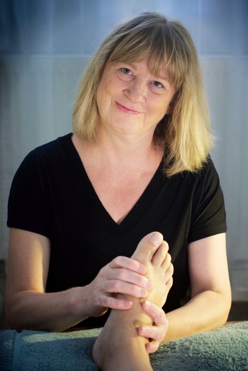 Samantha Whittington in the process of treating a client